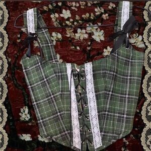 Green tartan corset top with lace up front and adjustable straps